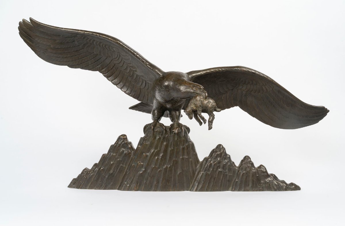 An Eagle With Outstretched Wings Holding A Lamb In Its Beak, A Bronze Sculpture Signed By Gilbert