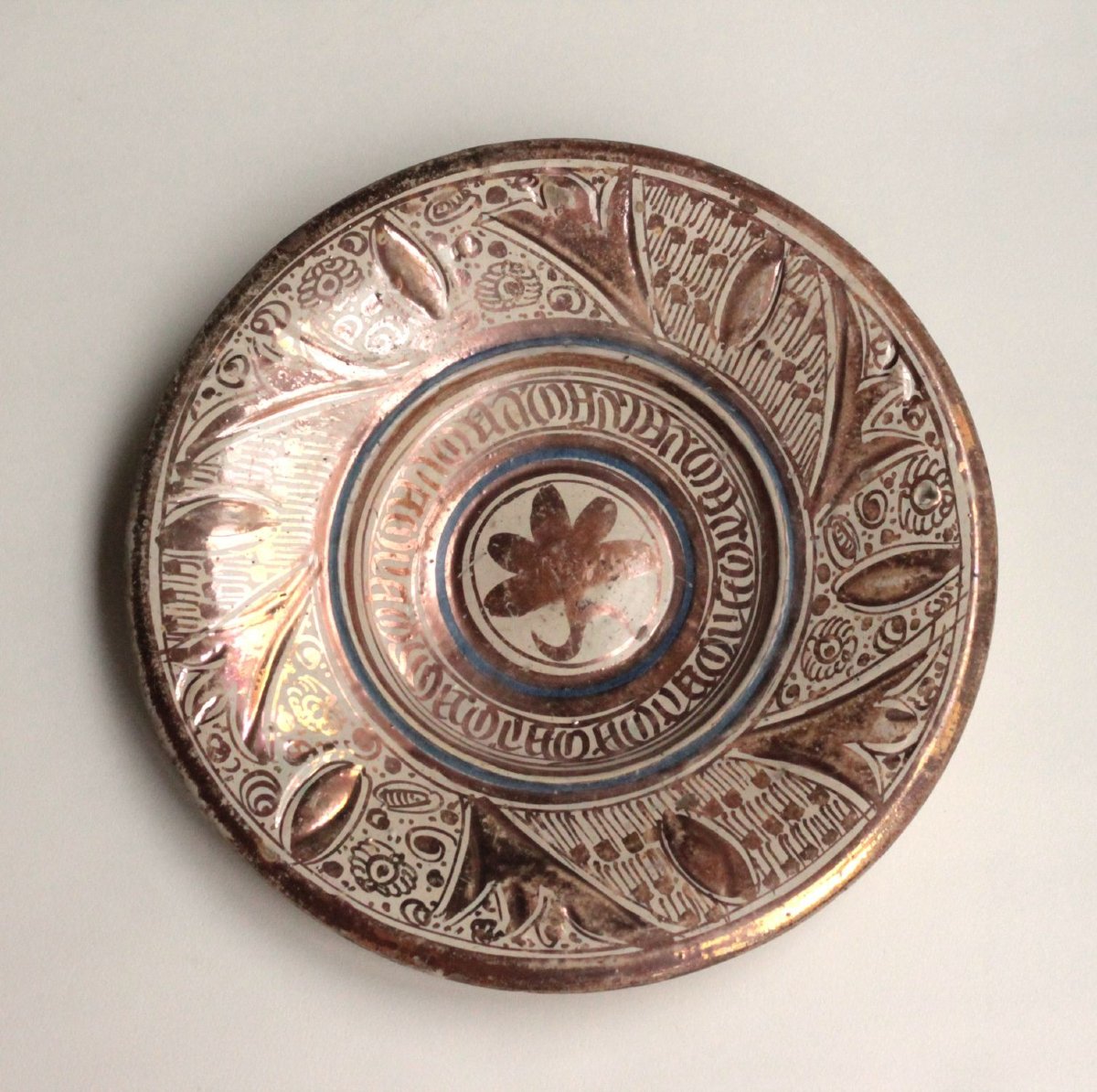Hispano-moorish Earthenware Dish With A Central Indentation, Seville, Late 15th Or Early 16th Century