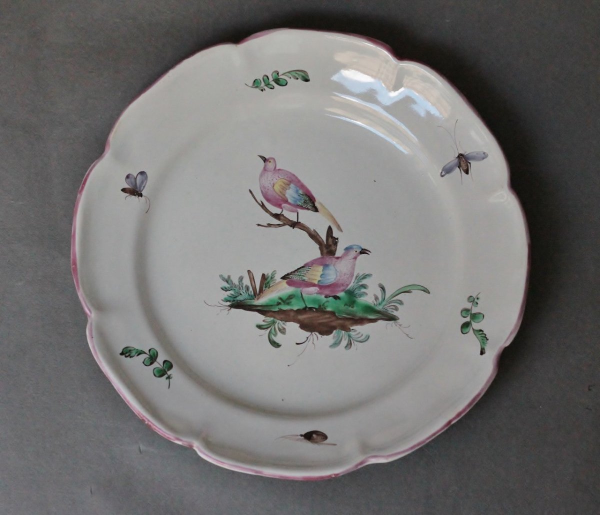 Aprey Earthenware Plate With Bird Decor. Eighteenth Century.