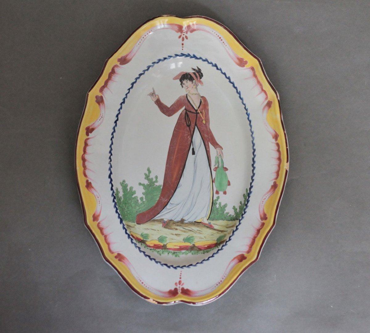 Oval Dish In Faience From Islettes Decorated With A Long Lady. Beginning Of The 19th Century.-photo-1