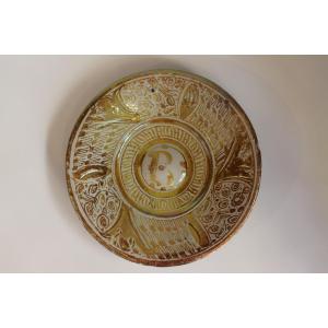 Plat à ombilice en faïence Hispano-Mauresque, Sèville, 1ere moitié du XVIe siècle.