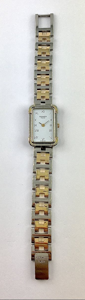 Montre Hermès « Heure H » dame en acier et métal doré, mouvement quartz, vers 2015.-photo-1