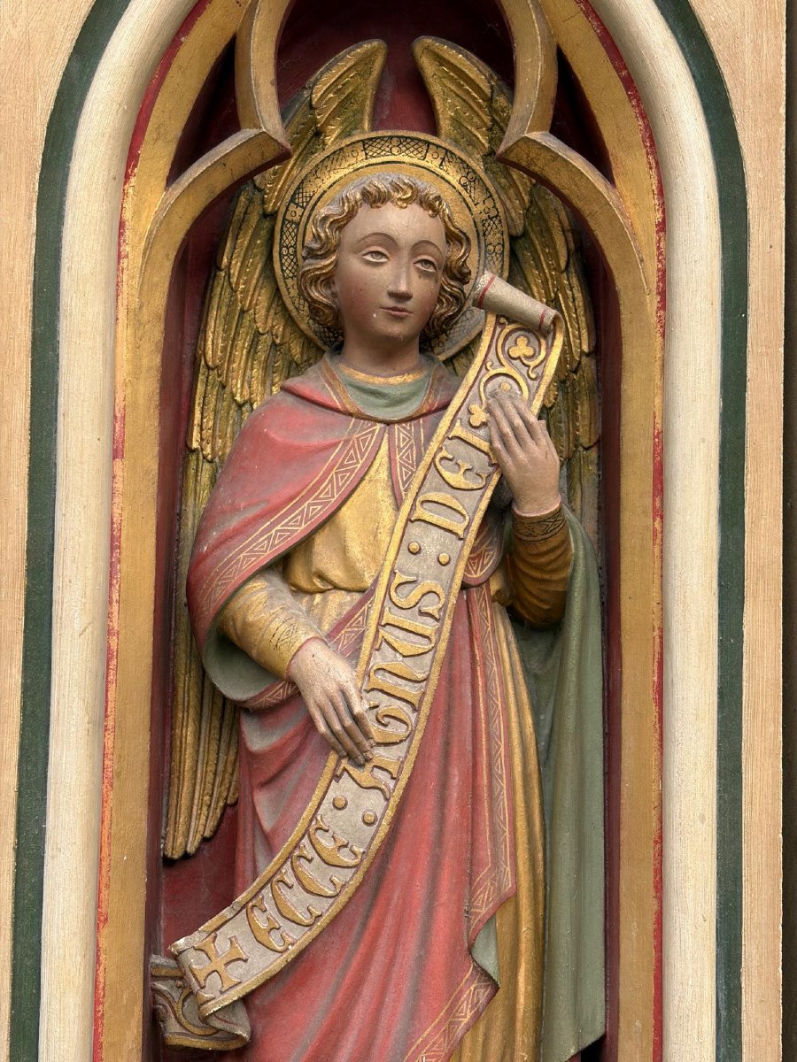 A Stone Altarpiece In The Neo-gothic Style, Adorned With Angels And The Lamb Of God-photo-2