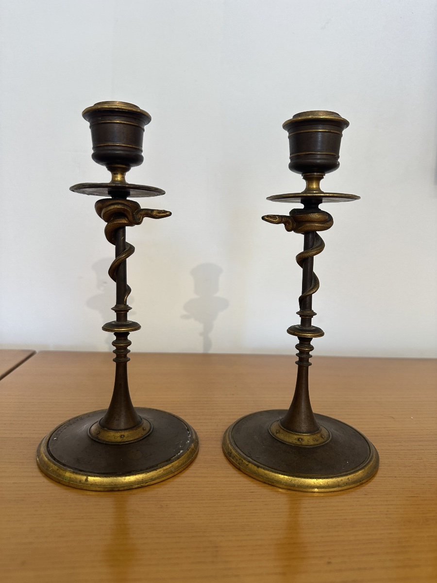 Paire de bougeoirs aux serpents 