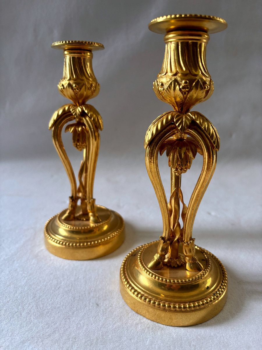 Paire de bougeoirs Directoire en bronze doré