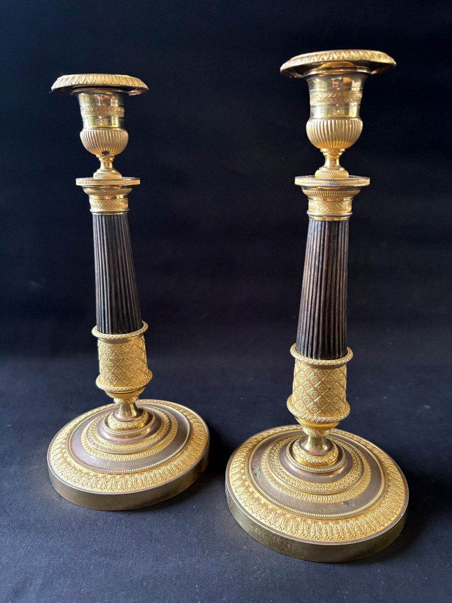 Pair Of Empire-style Candlesticks Signed Mene In Gilt Bronze