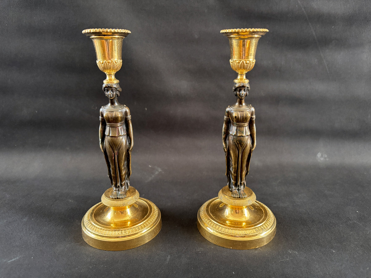 Pair Of Empire-style Caryatid Candlesticks In Gilt And Patinated Bronze