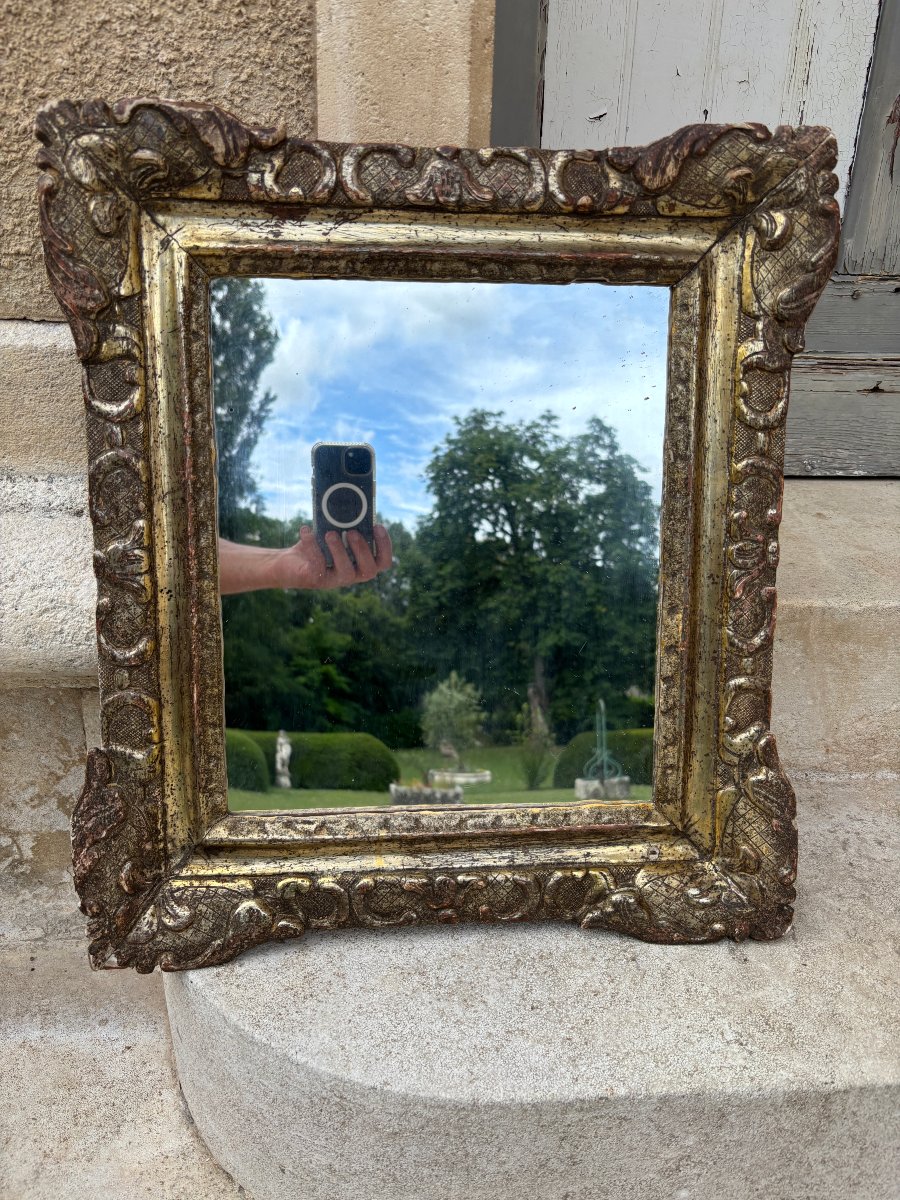 Miroir cadre Louis XIV en bois argenté