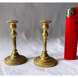 Pair Of Doll Candlesticks In Gilt Bronze