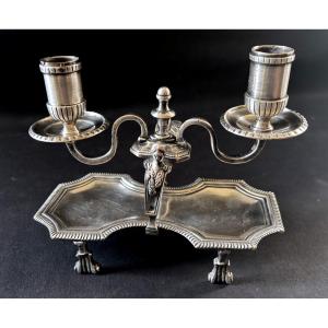 Bougeoir à main époque régence en bronze argenté