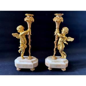 Pair Of Gilded Bronze Angelot Candlesticks