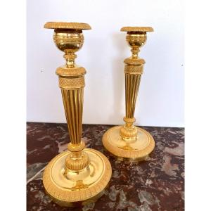 Pair Of Empire Period Candlesticks In Gilt Bronze