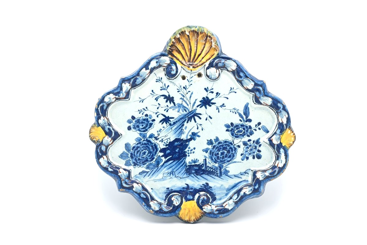 Delft Earthenware Wall Plate With Blue-and-white Decoration And A Polychrome Frame, Mid-18th Century