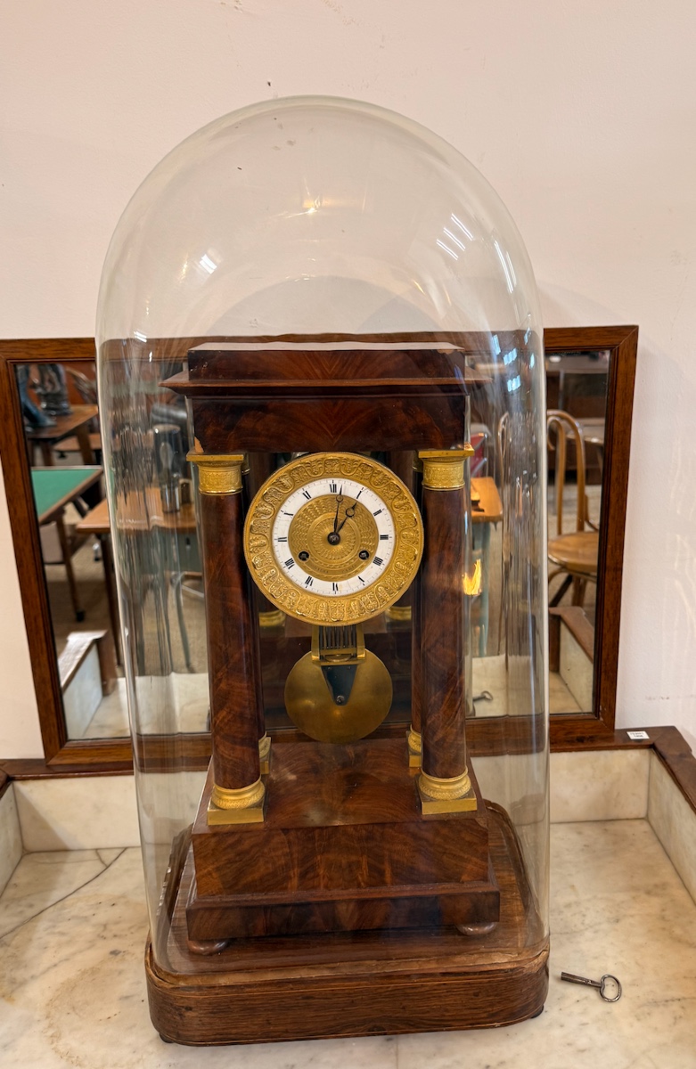 Empire Style Portico Clock In Mahogany And Gilt Bronze Under Globe