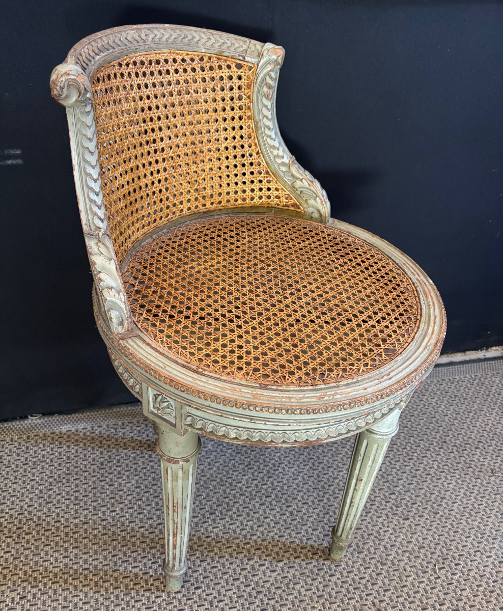 Petit fauteuil tournant de style Louis XVI 