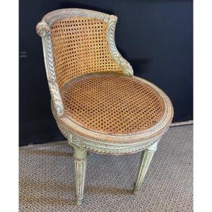 Petit fauteuil tournant de style Louis XVI 