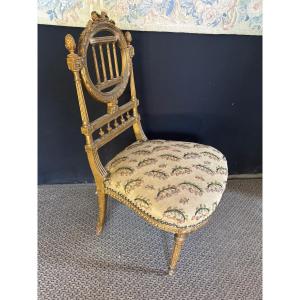 Petite chaise basse style Louis XVI 