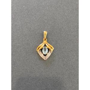 Pendentif en or et topaze