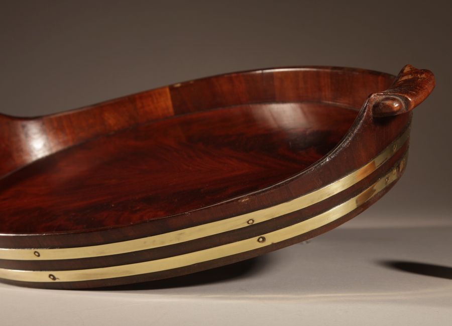 A Very Decorative And Useful Original Oval Mahogany And Brass Coopered Tray.