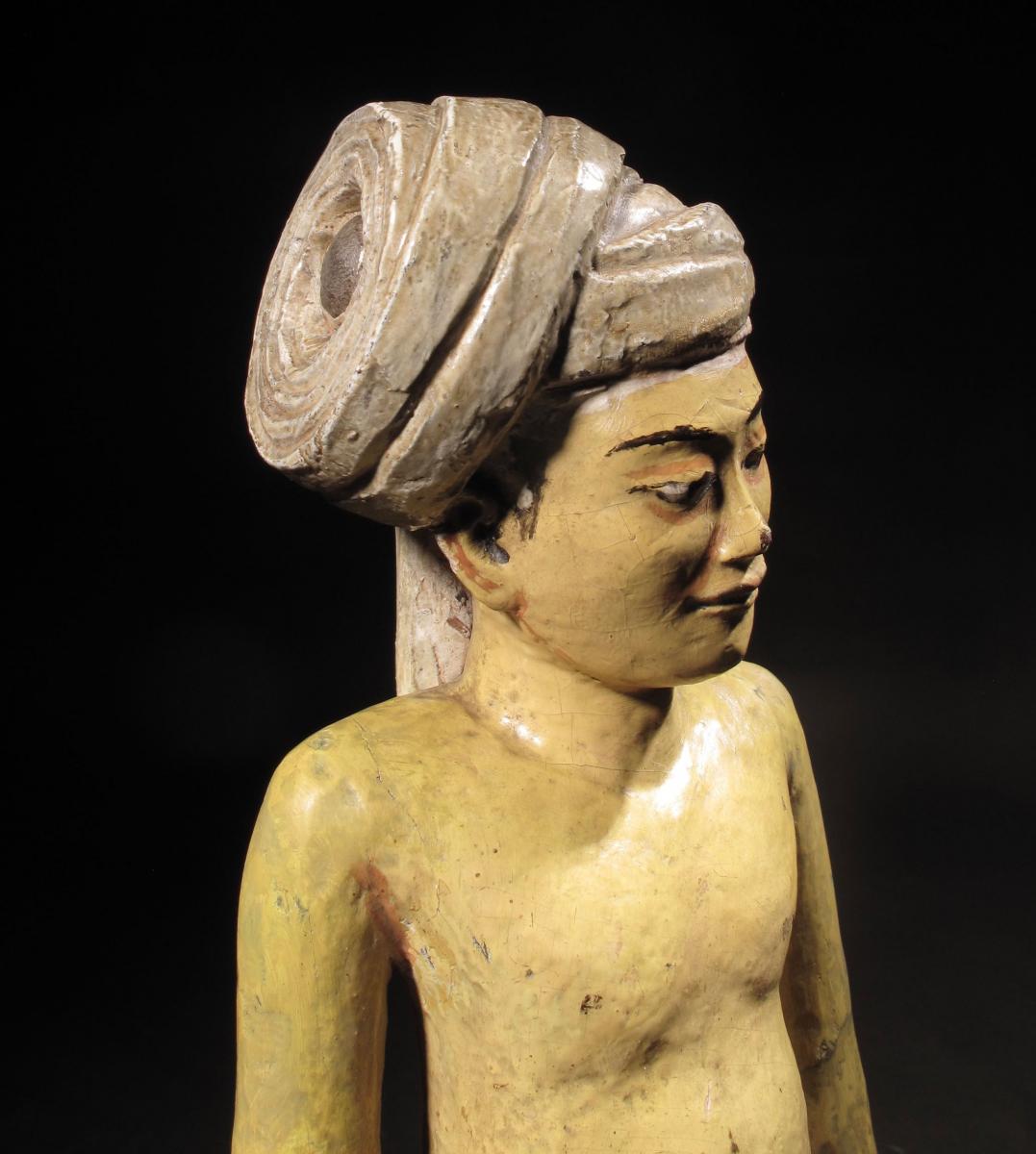 An Interesting And Decorative Polychrome Finally Carved Indian Figure.