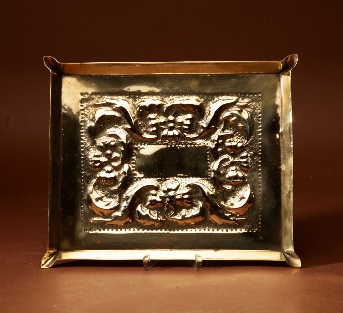 A Decorative Glasgow School Embossed Brass Tray. Circa 1900.