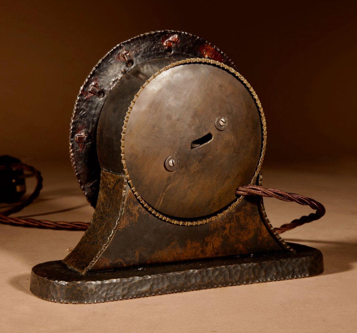 A Very Stylish Amsterdam School Hammered Patinated Brass Early Electrical Mantel Clock.-photo-2