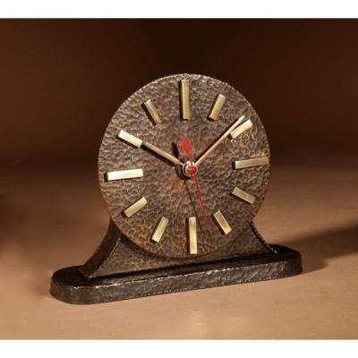 A Very Stylish Amsterdam School Hammered Patinated Brass Early Electrical Mantel Clock.