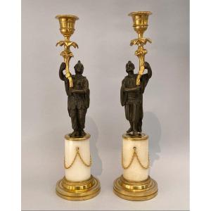 Pair Of Louis XVI Candlesticks With Chinoiserie, In Gilt And Patinated Bronze With Marble Base.