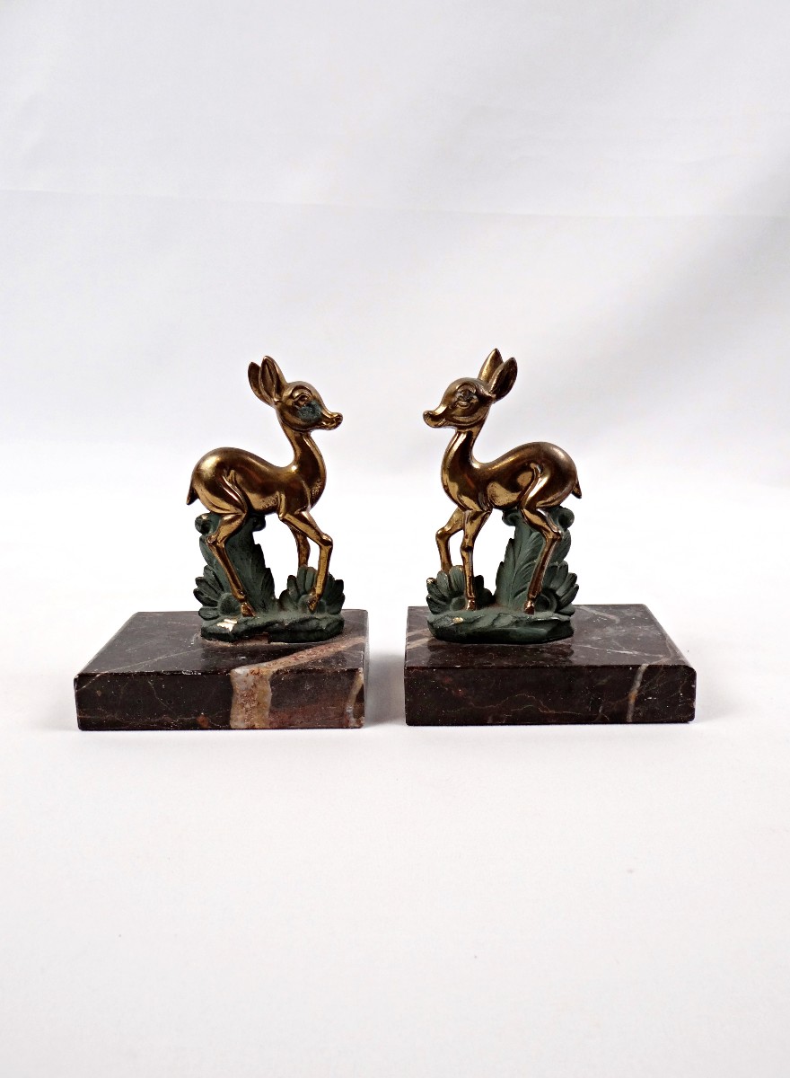 Paire de serre-livres Art Déco biches ou bambi en régule et marbre doré