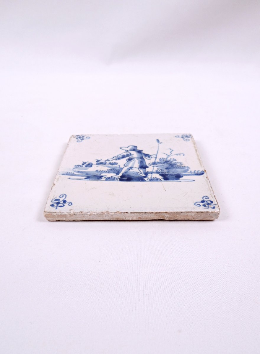 18th-century Delftware Tile Depicting A Peasant Scene With A Farmer Seen From Behind-photo-2