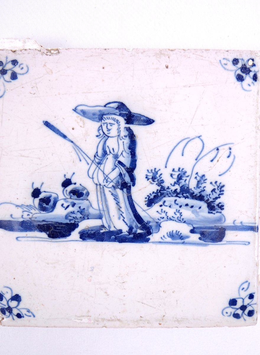 18th-century Delftware Tile Depicting A Peasant Woman With A Stick, Facing Forward-photo-4
