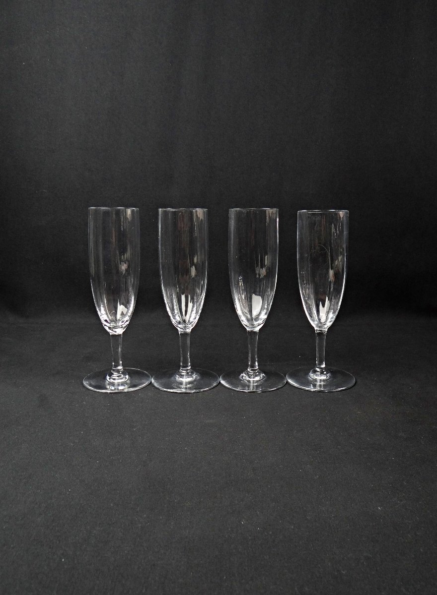 Baccarat série de 4 flûtes à champagne en cristal modèle Montaigne Optic 