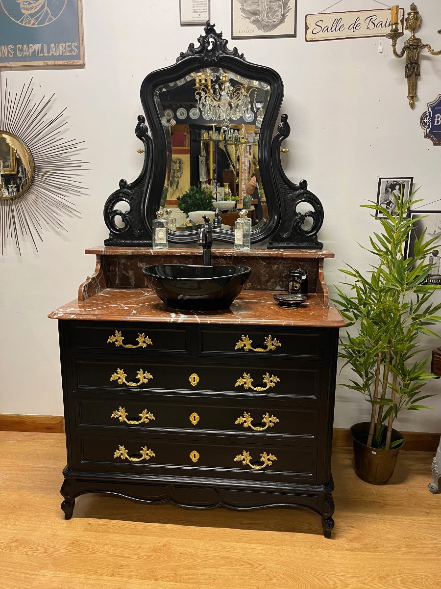 Antique Bathroom Cabinet With Mirror, Sink, And Toilet Fixtures