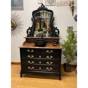 Antique Bathroom Cabinet With Mirror, Sink, And Toilet Fixtures