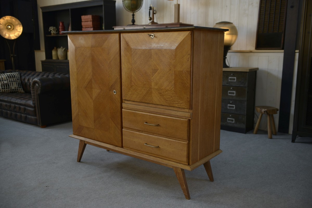 Buffet secrétaire en chêne avec un plateau cuir et pieds compas 1960's