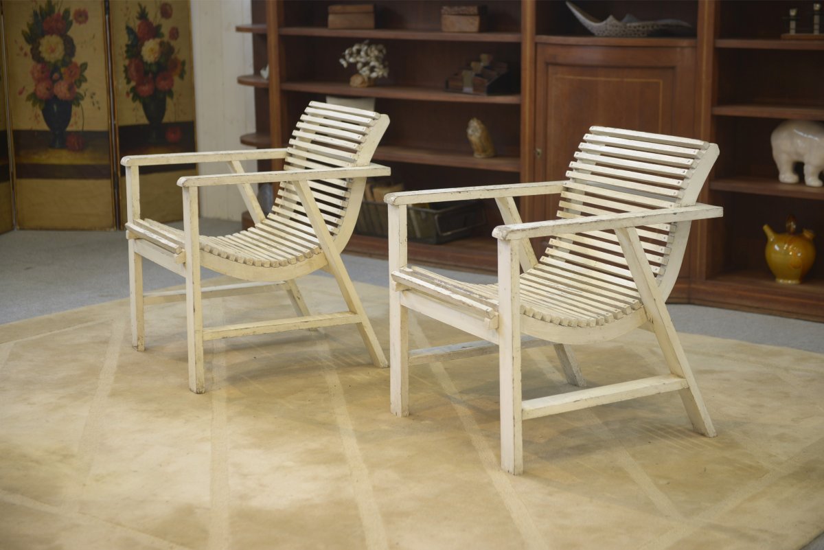 Paire de fauteuils en bois 1950's
