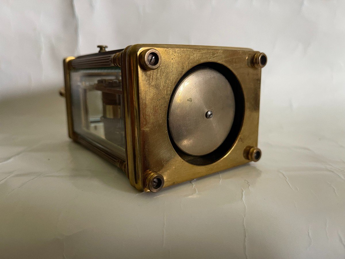PENDULETTE DE VOYAGE NOIRE ET DORÉE PONTIFA AVEC ALARE - Avec pied