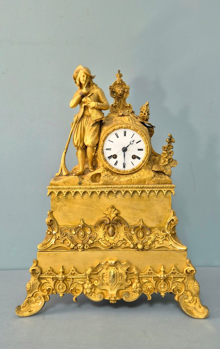 L'enfant et le liévre: pendule en bronze doré.