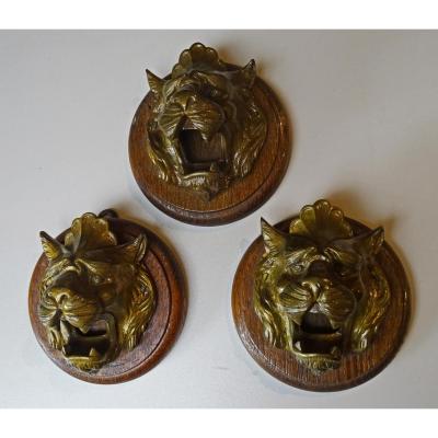 Three Medallions In Wall - Bronze Lion Heads