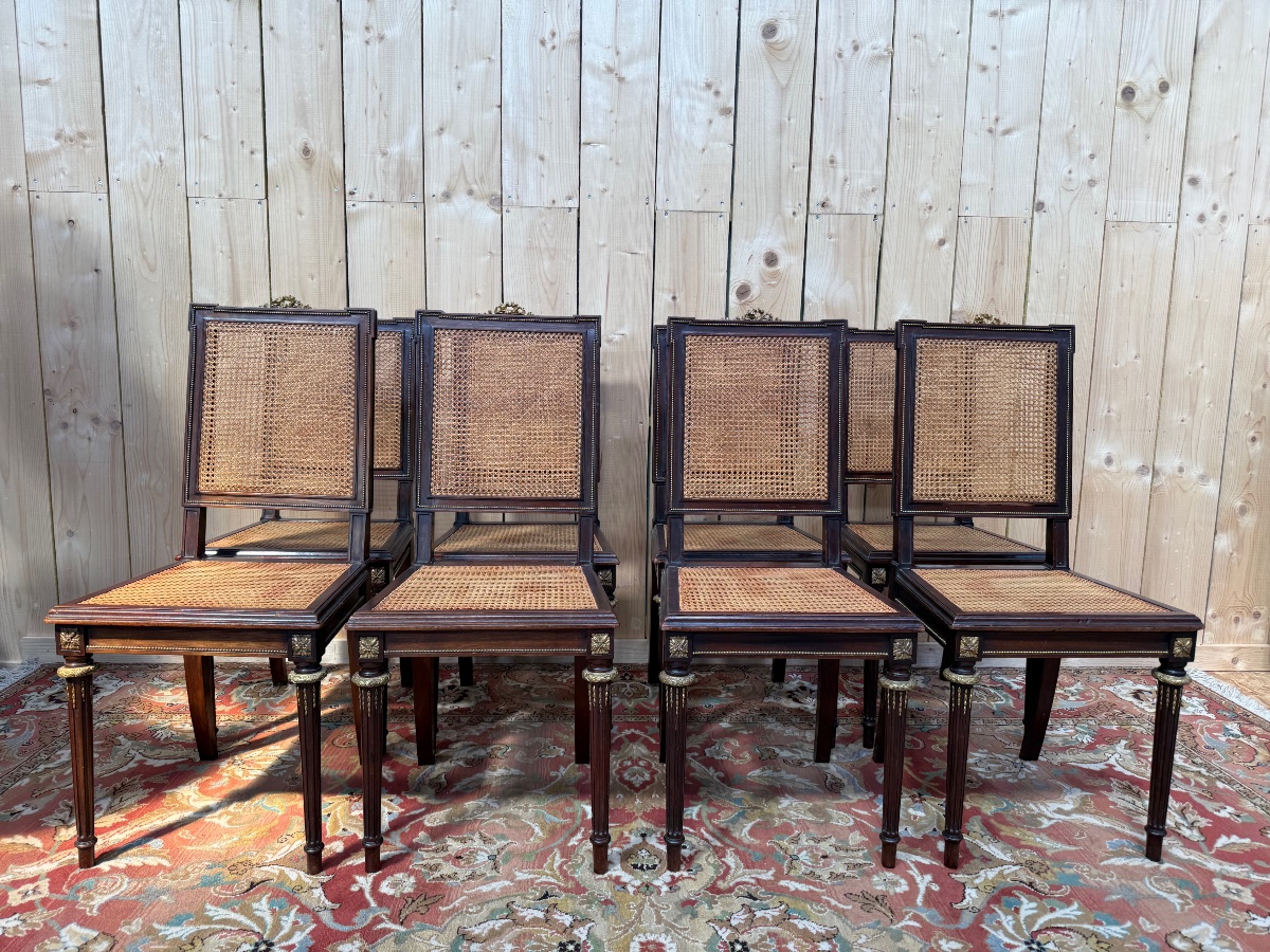 Suite de 8 chaises de style Louis XVI en acajou et cannage 