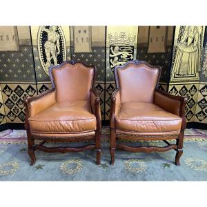 Pair Of English Bergeres In Havana Leather