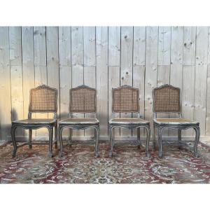 Suite de 4 chaises cannées de style Louis XV rechampi 