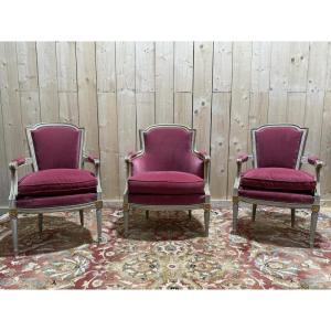 Paire de fauteuils et bergère et style Louis XVI