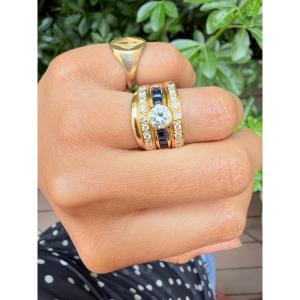 Bague Bandeau en or jaune saphirs et diamants