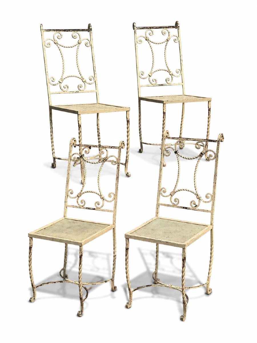 suite de quatre chaises en fer forgé