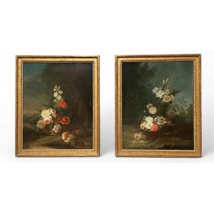 Paire d'Huiles sur toile- Compositions florales dans un paysage dans le goût de Oudry