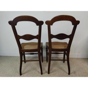Pair Of Antique Solid Wood Chairs With Gendarme Hats And Cane Seats