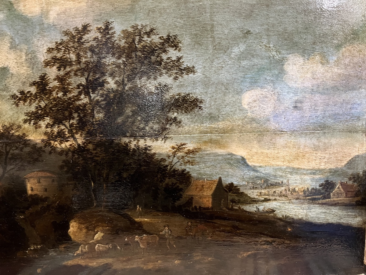 Grande huile sur panneau, paysage flamand, XVIIeme siècle.