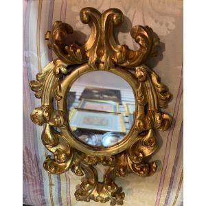 Miroir italien en bois doré, XVIII éme. 