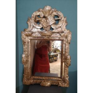 Miroir bois doré à la feuille d'argent, époque Louis XV 